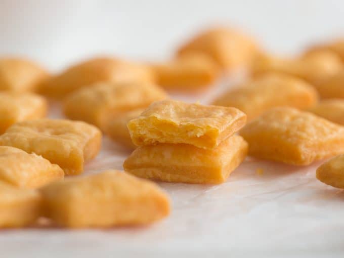 Inside flaky texture of cheddar cheese squares