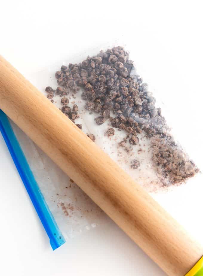 chopping chocolate chips with rolling pin