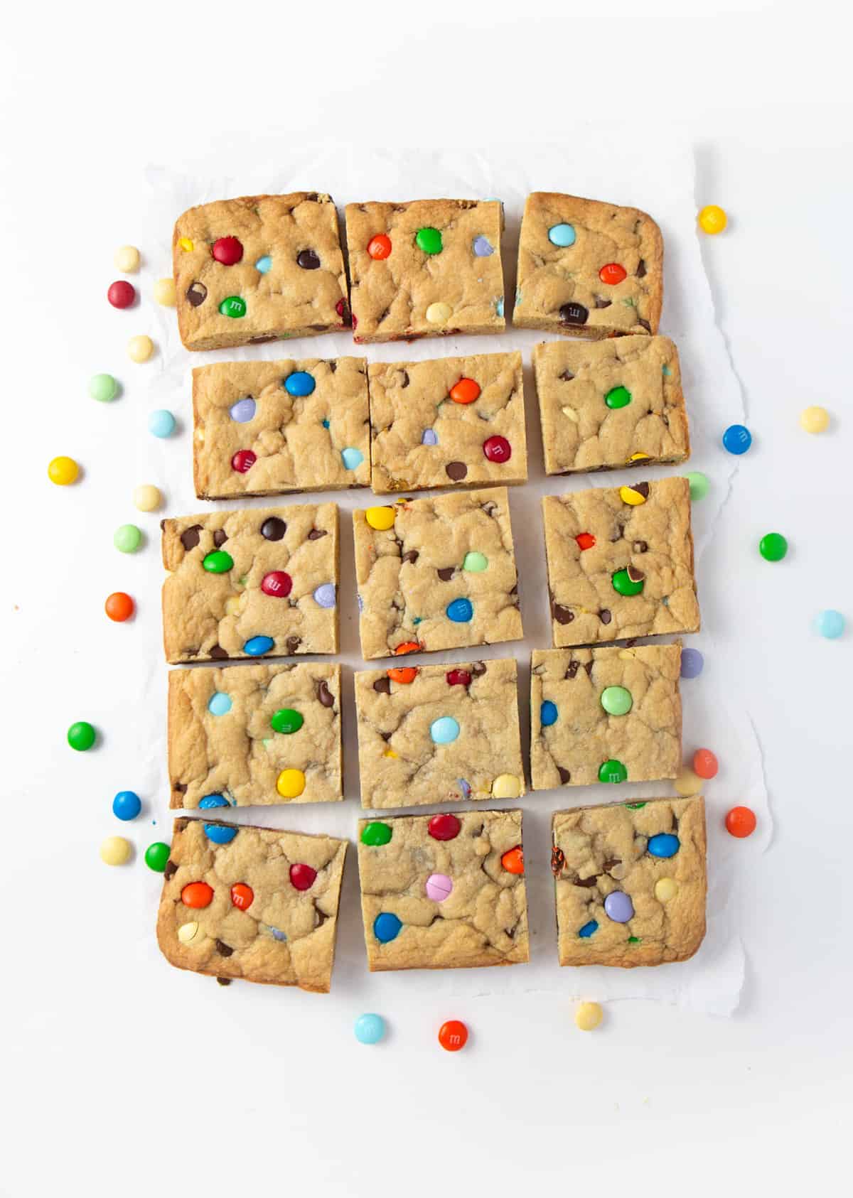 Chewy M&M Cookie bars cut into squares