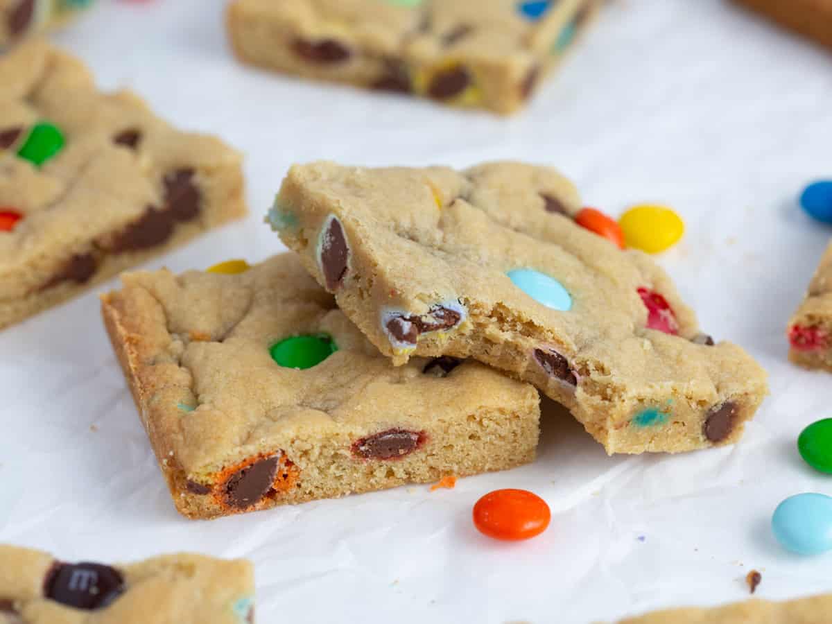 Chewy M&M Cookie bar squares with bite