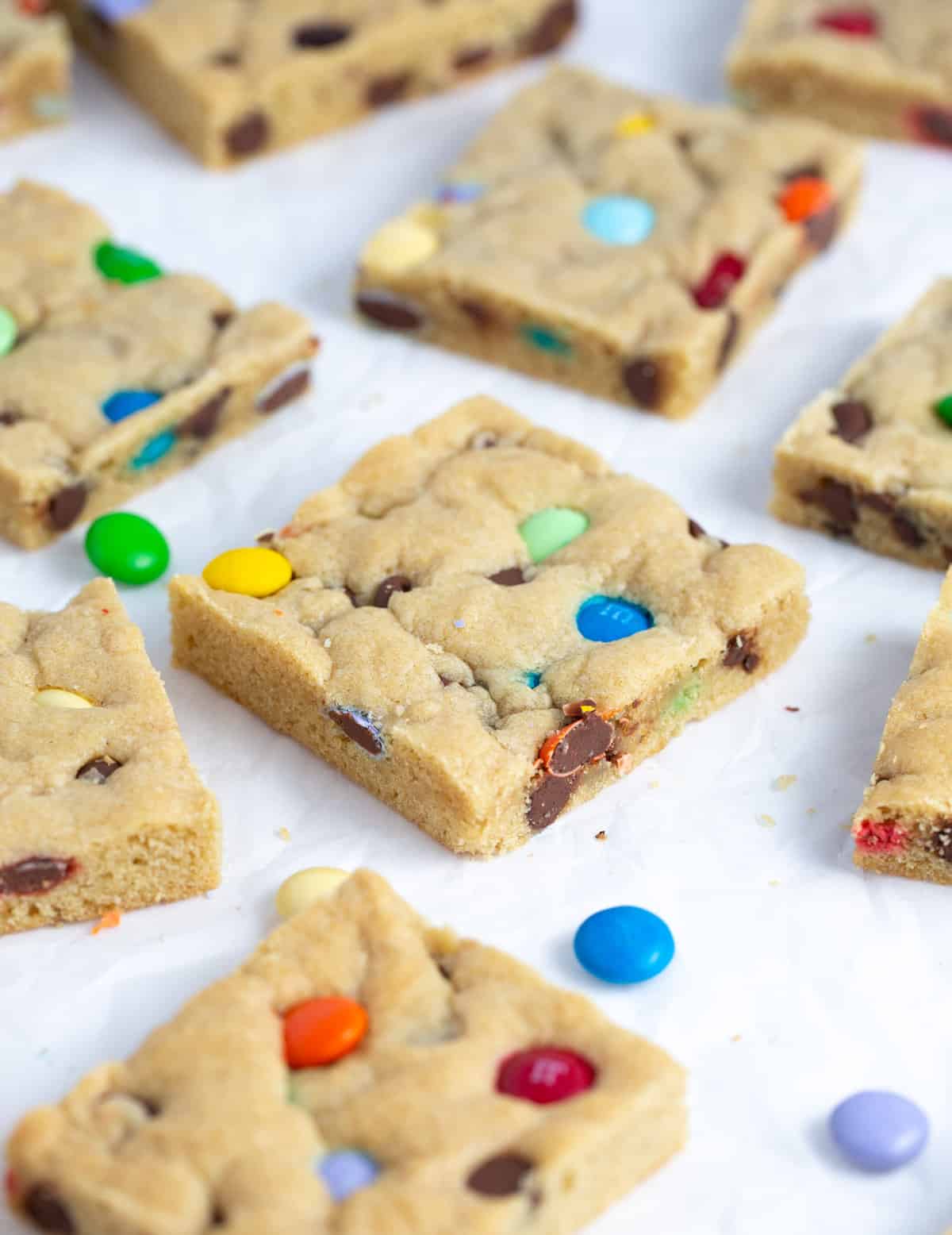 Chewy M&M Cookie bars cut into squares