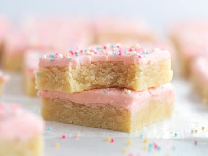 Soft frosted sugar cookie bars with bite