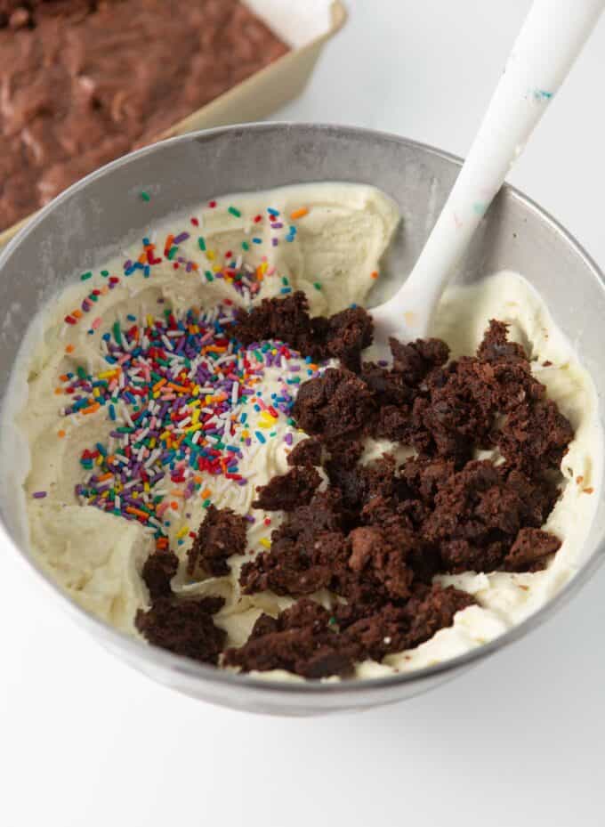 bowl of ice cream with brownies and sprinkles