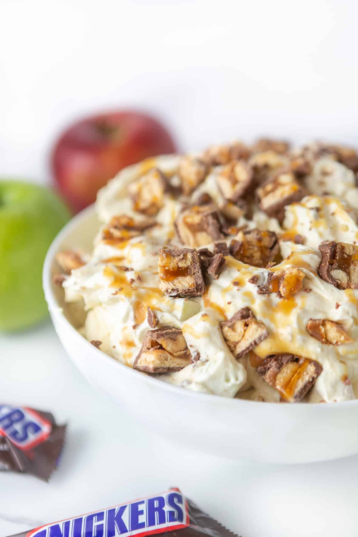 Bowl of creamy apple snickers salad dessert