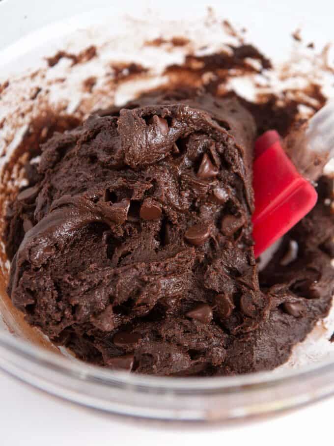 Chocolate cake mix cookie dough with red spatula