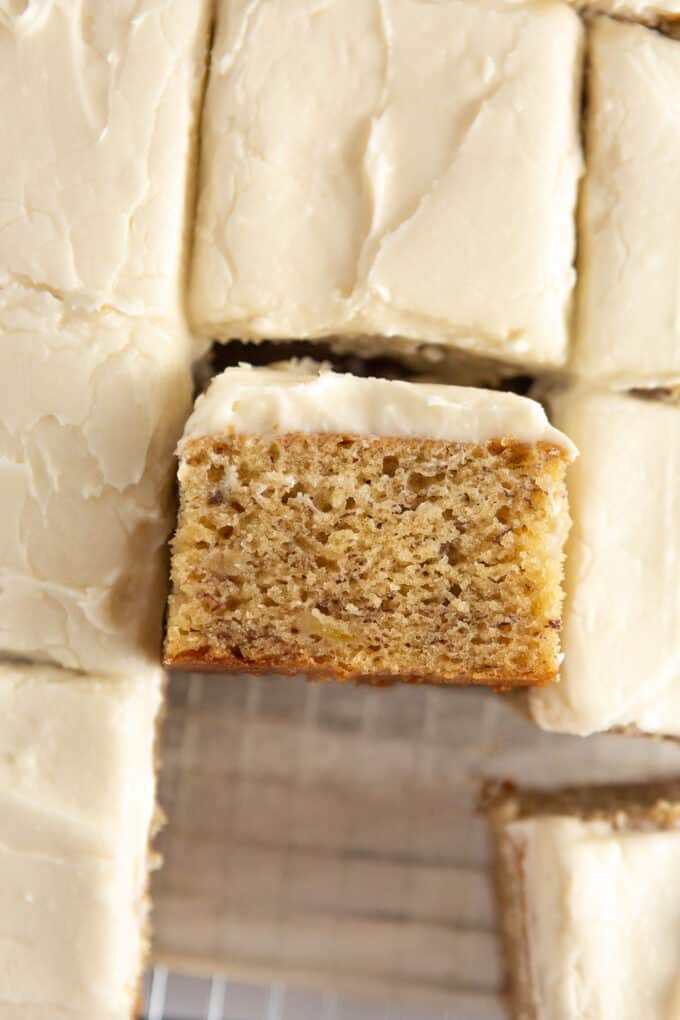 Banana bars with cream cheese frosting cut into squares