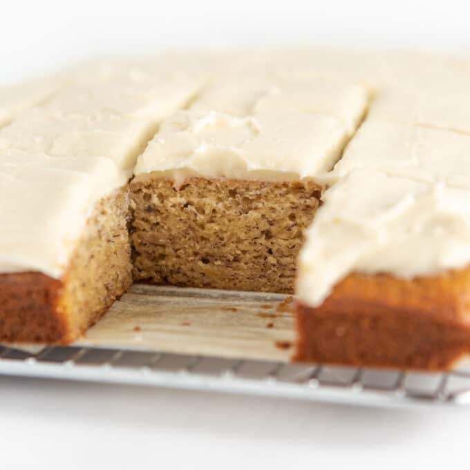 Banana bars with cream cheese frosting cut into squares