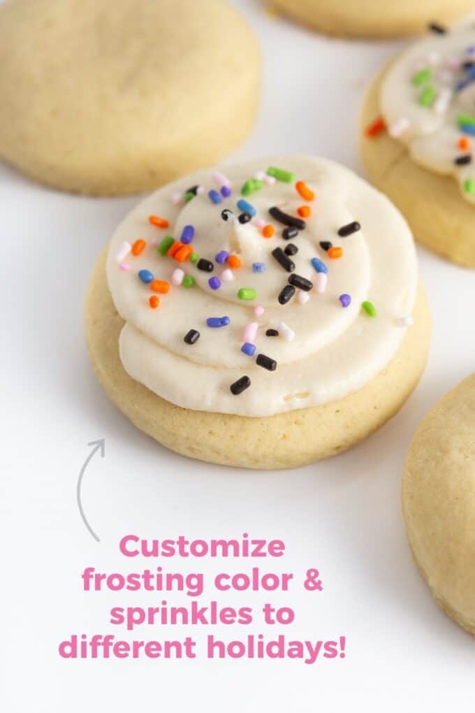 fluffy sugar cookies with frosting and halloween sprinkles