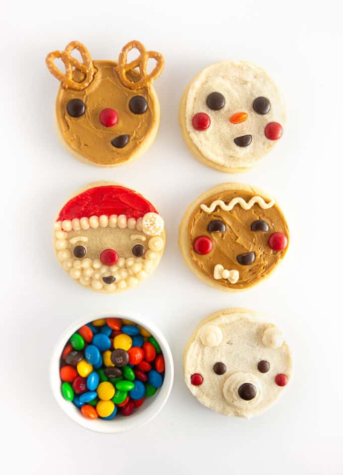 5 easy christmas cookie ideas for kids including reindeer, santa, snowman, gingerbread man, and polar bear