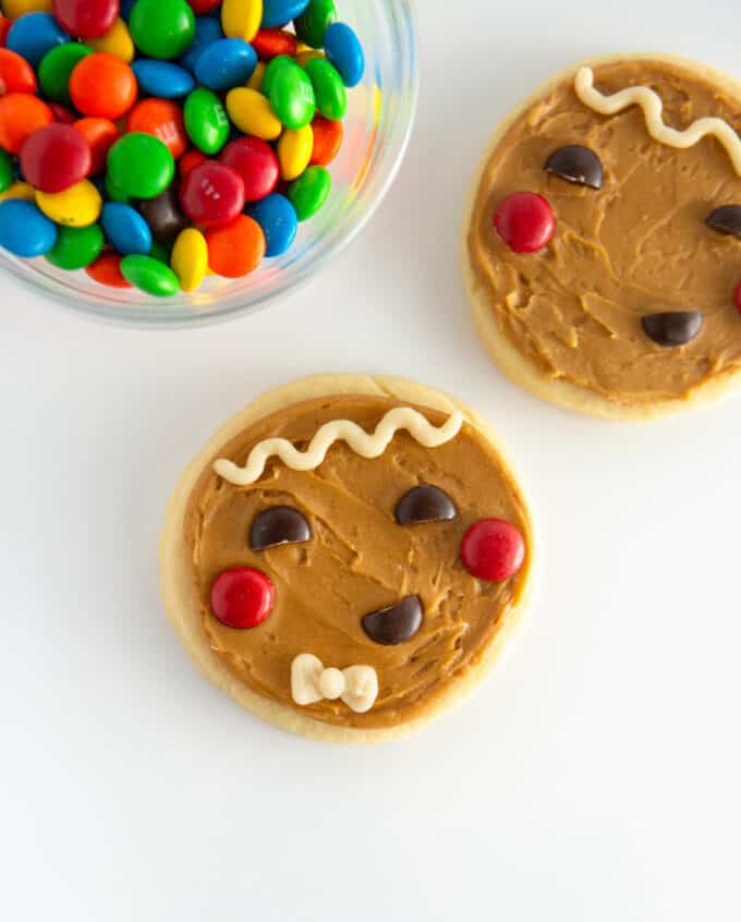 brown gingerbread man cookies with M&M face