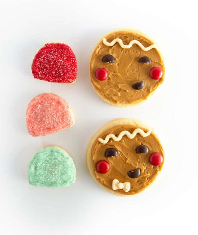 brown gingerbread man face cookies with mini colorful gumdrop cookies