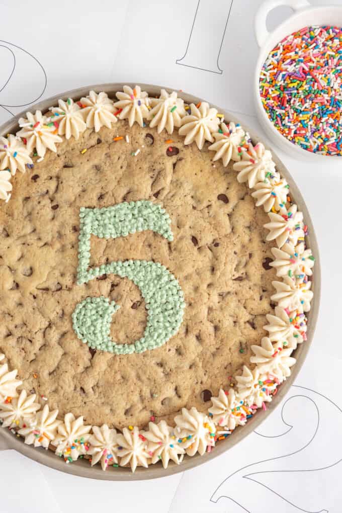 chocolate chip giant birthday cookie cake with sprinkles and cake number stencil #5