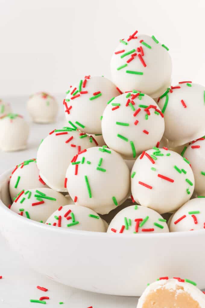 white chocolate sugar cookie truffles with red and green sprinkles