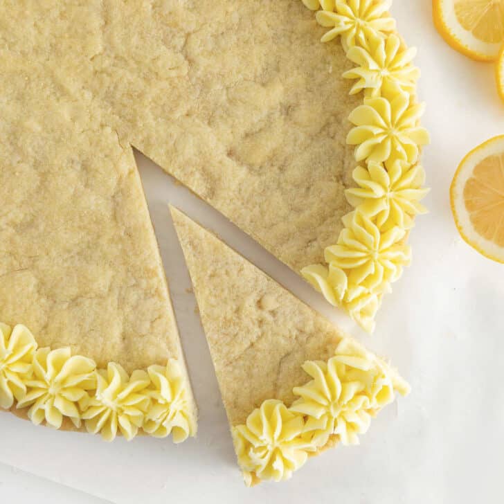 https://www.designeatrepeat.com/wp-content/uploads/2022/02/lemon-cookie-cake-featured-copy-728x728.jpg