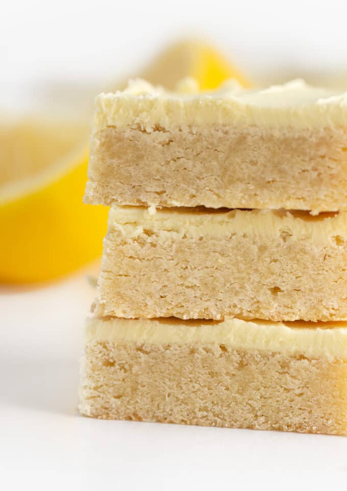 stack of lemon sugar cookie bars with lemon buttercream