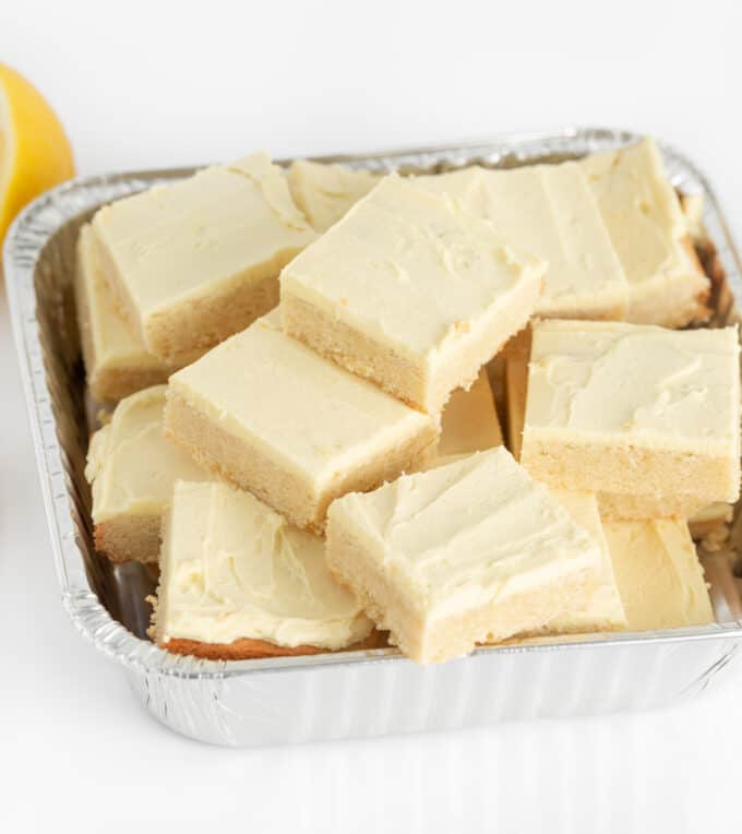 pan of cut lemon sugar cookie bar squares