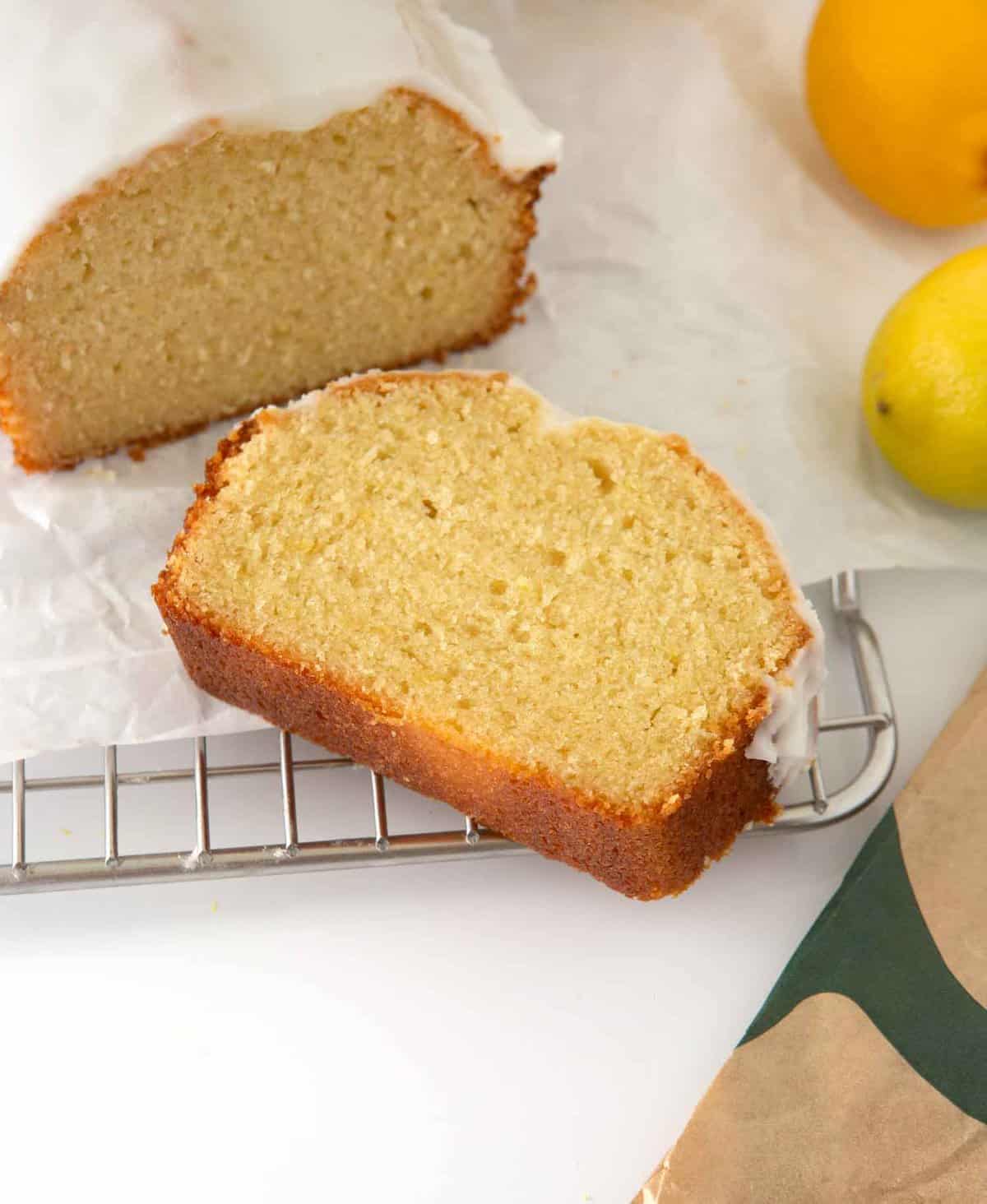 slice of lemon loaf on cooling rack