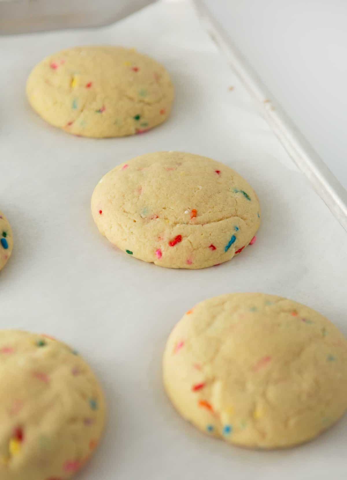 baked birthday cake cookies on sheet pan