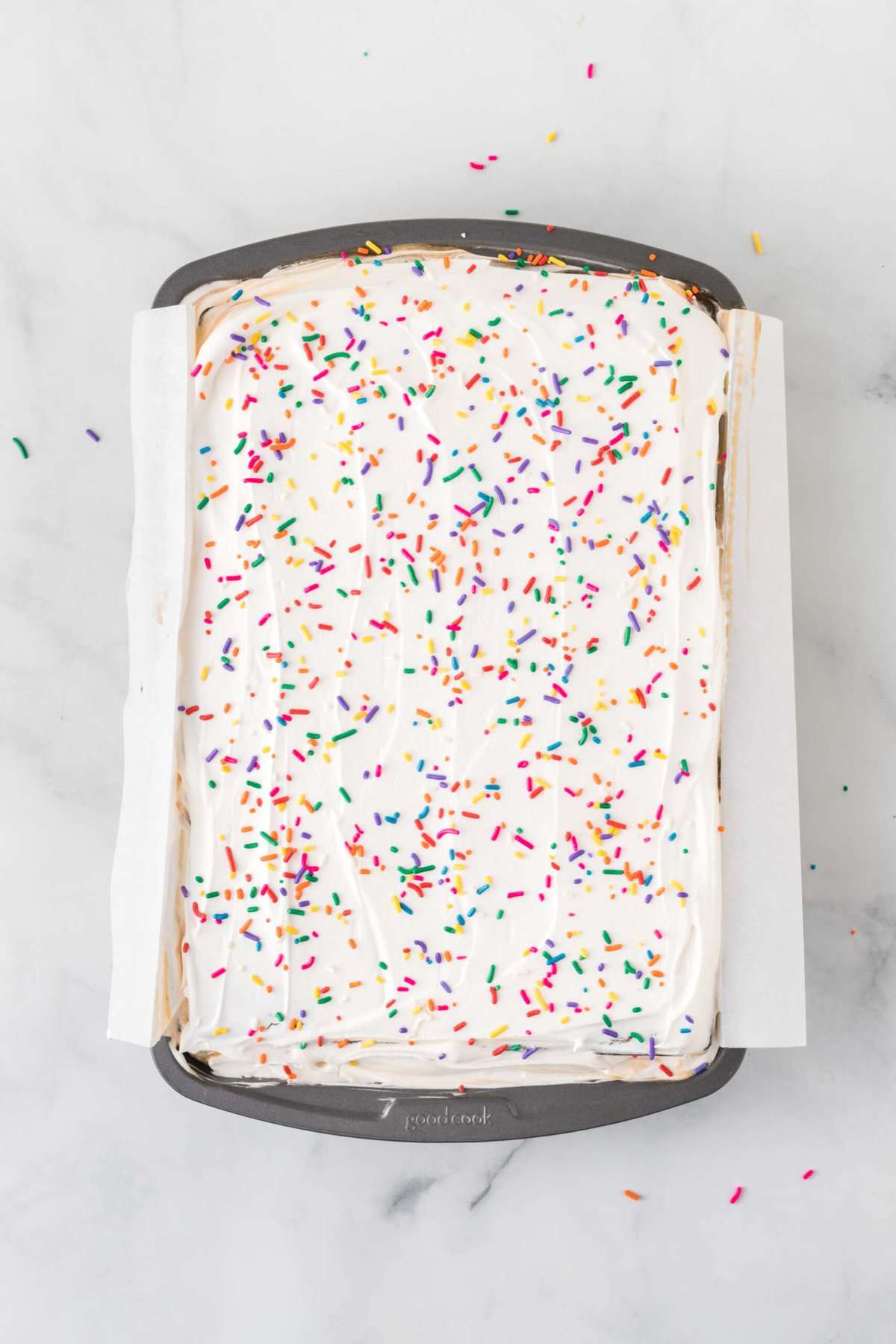 Overhead view of finished ice cream sandwich cake in pan