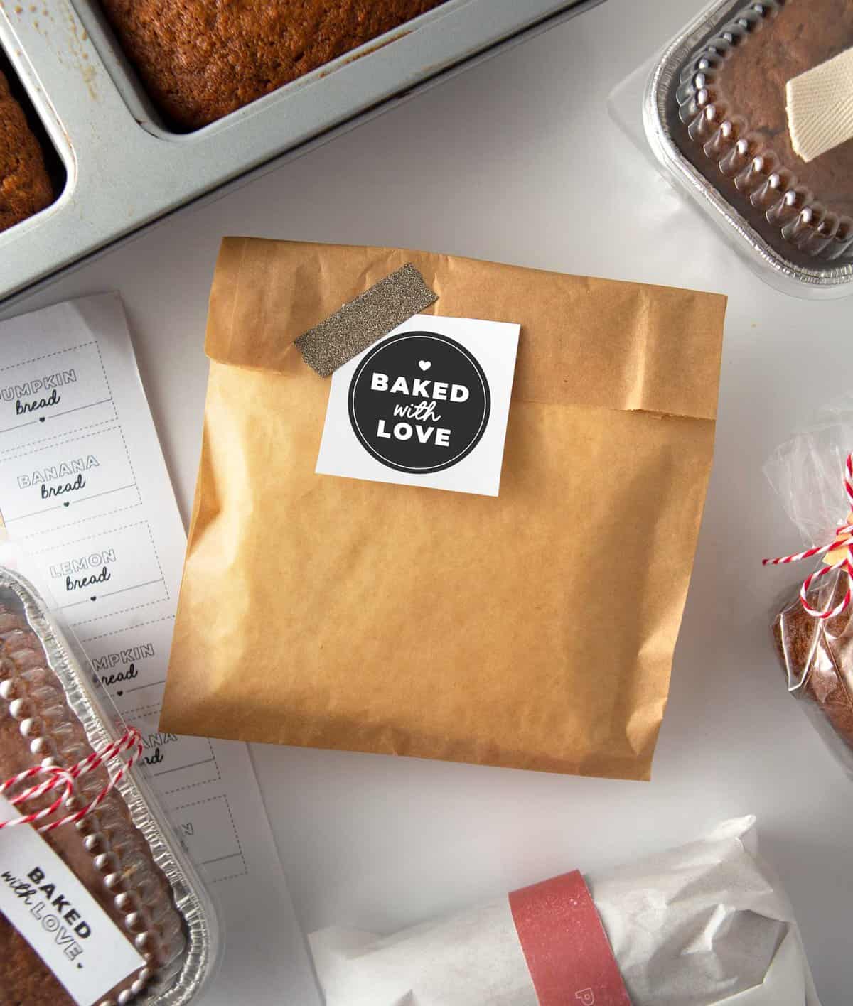 slice of banana bread in food safe pouch with "baked with love" gift tag 