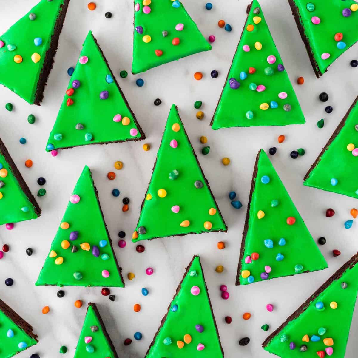 https://www.designeatrepeat.com/wp-content/uploads/2022/11/cosmic-christmas-tree-brownies-sq.jpg