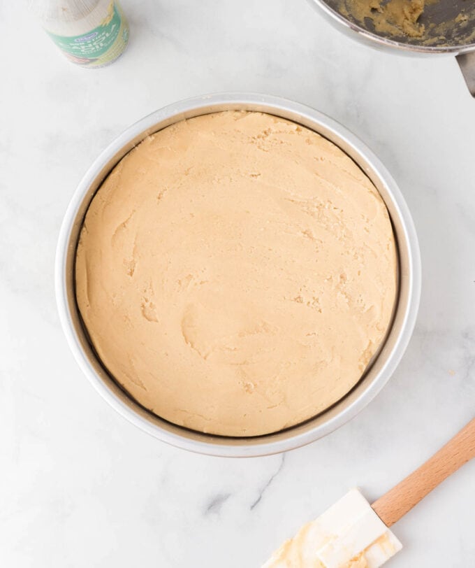 sugar cookie dough in round metal pan
