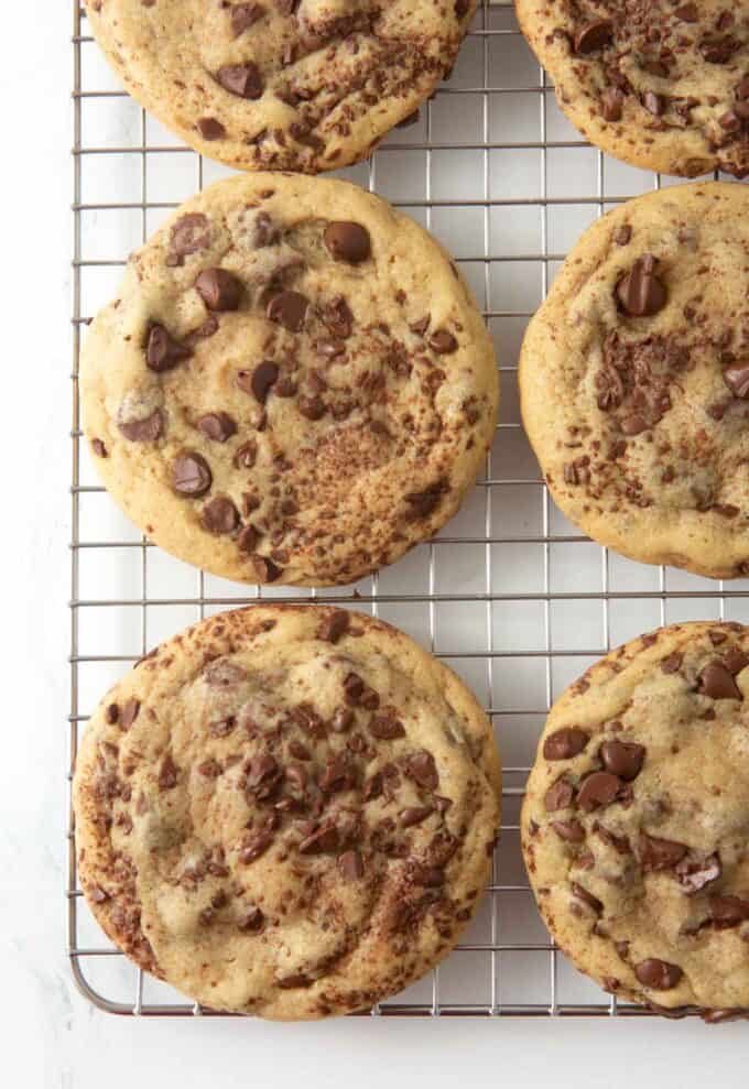 bakery style chocolate chip cookies on cooling rack