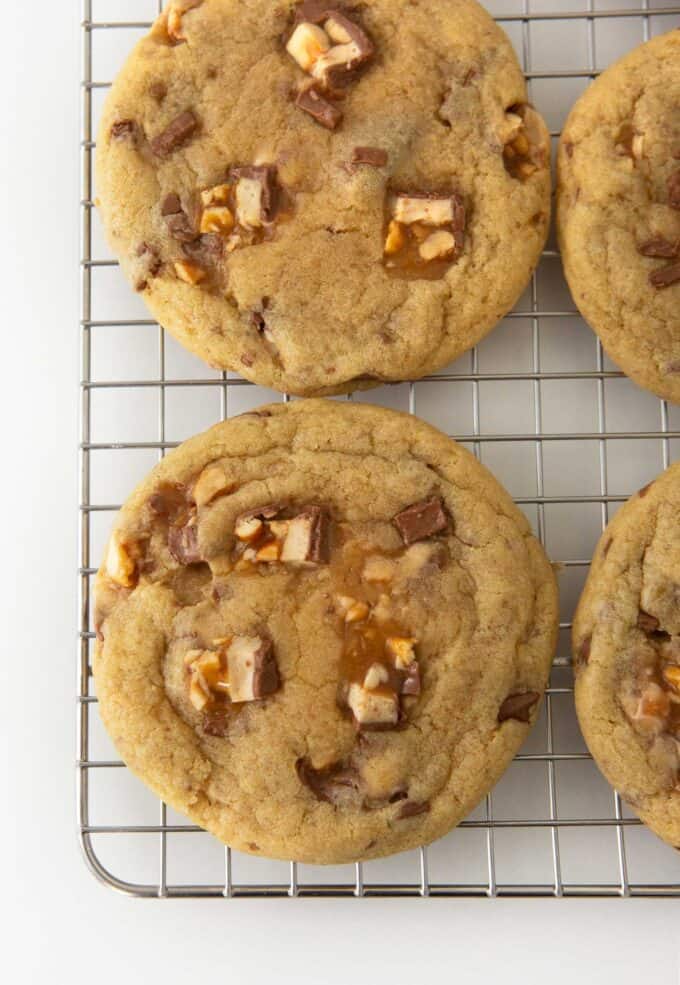 snickers cookies on wire cooling rack
