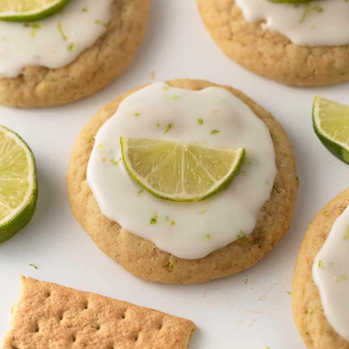 chewy key lime cookies with glaze and lime wedge