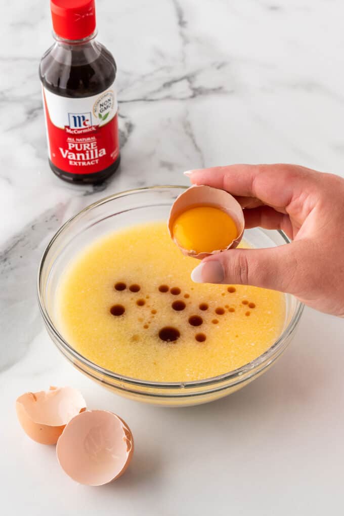 separating egg yolk from egg whites to make crispy waffles