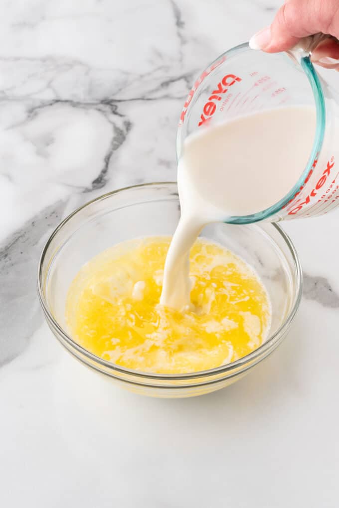 mixing wet ingredients to make crispy waffles