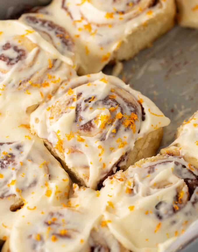 gooey orange cinnamon rolls with cream cheese frosting