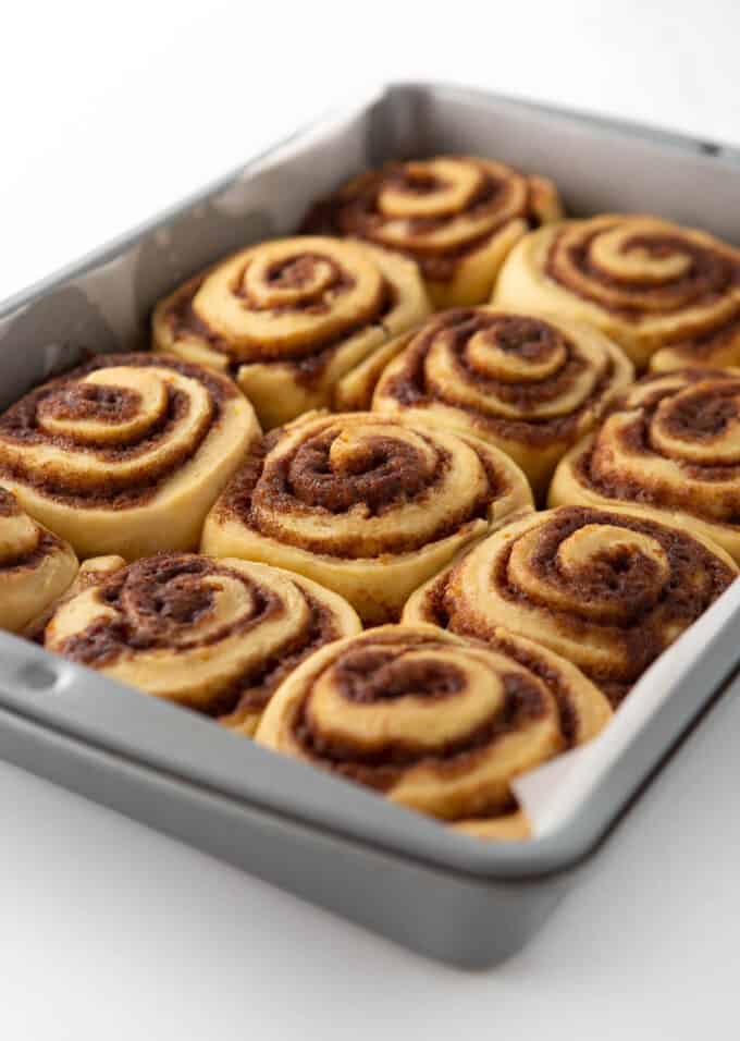 pan of baked orange cinnamon rolls