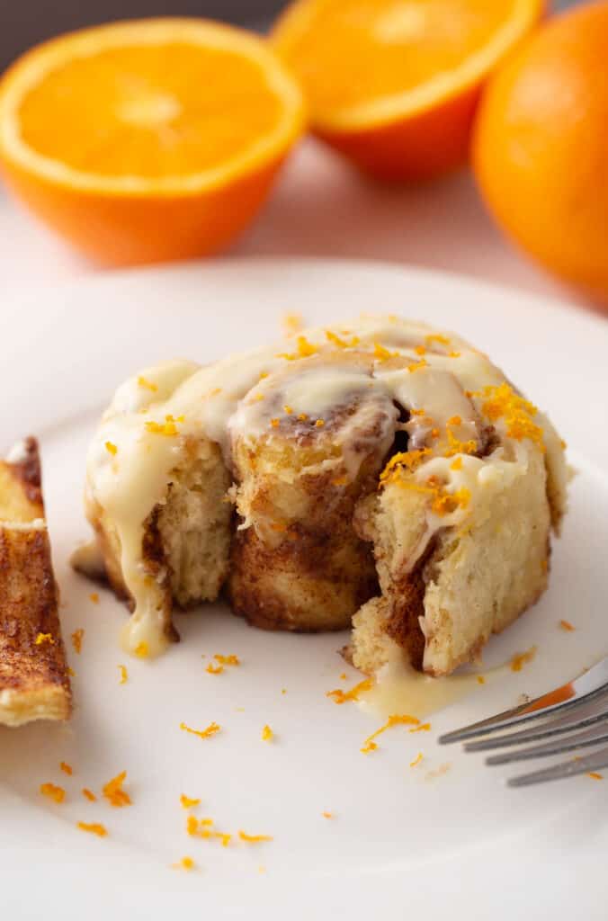 gooey orange cinnamon rolls with cream cheese frosting