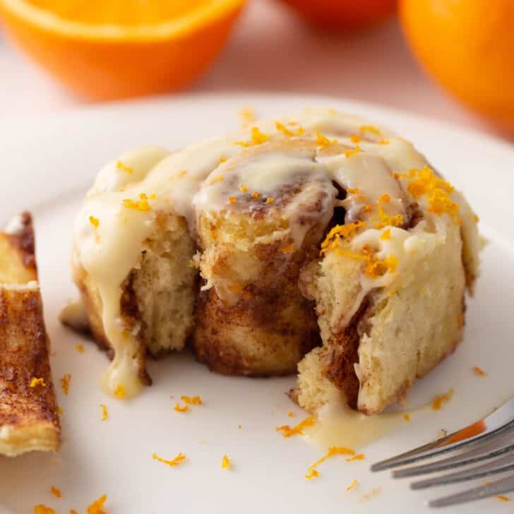 gooey orange cinnamon rolls with cream cheese frosting