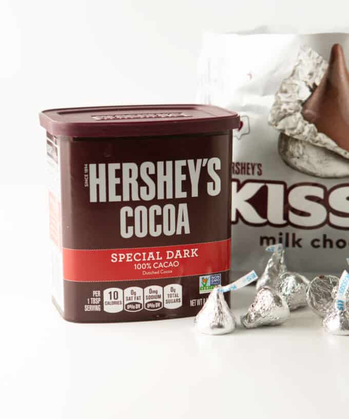container of hershey's special dark cocoa and bag of hershey kisses