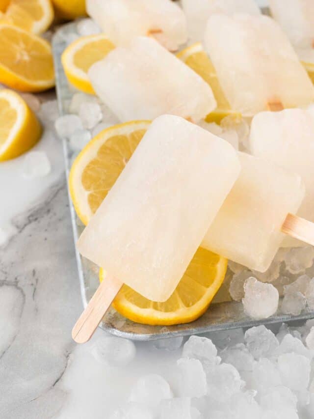 lemon popsicles on tray of ice