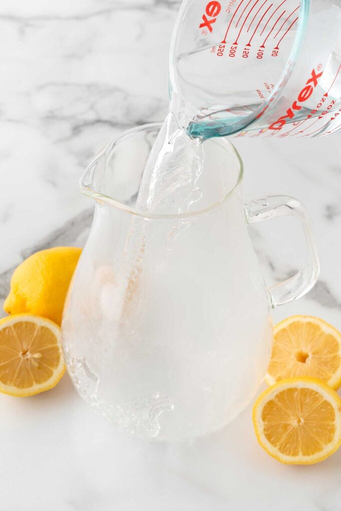 pouring hot water into pitcher