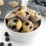 bowl of mini blueberry muffins