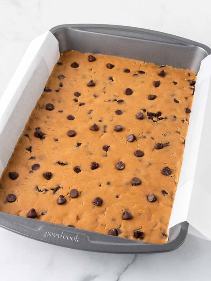 peanut butter chocolate chip cookie dough in pan