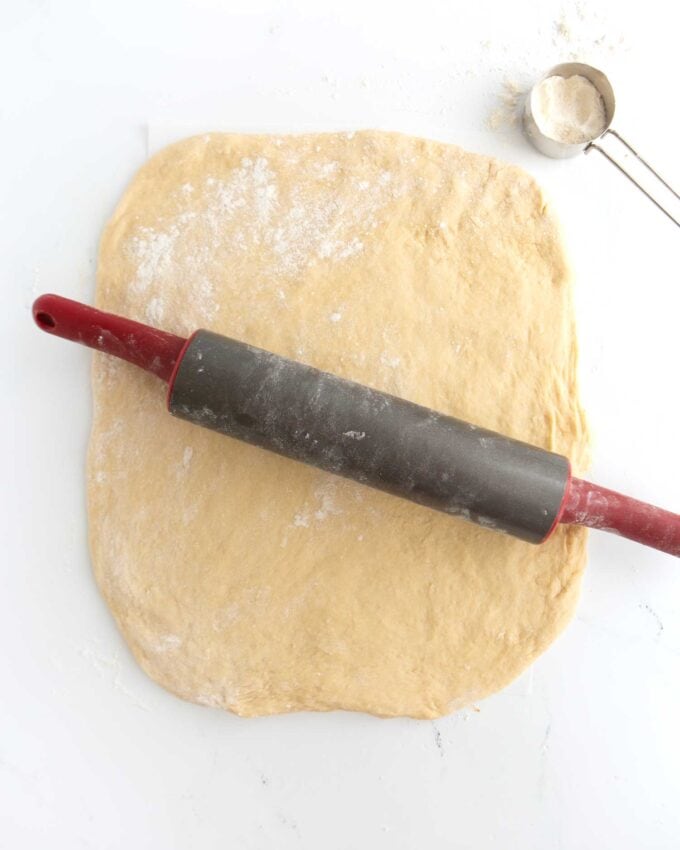rolled out dough with rolling pin