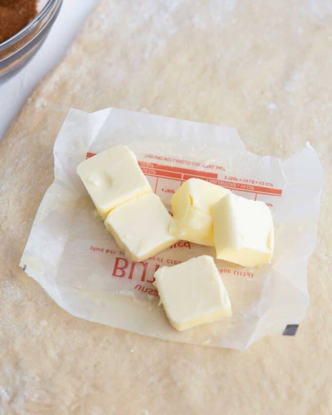 softened butter squares on wrapper