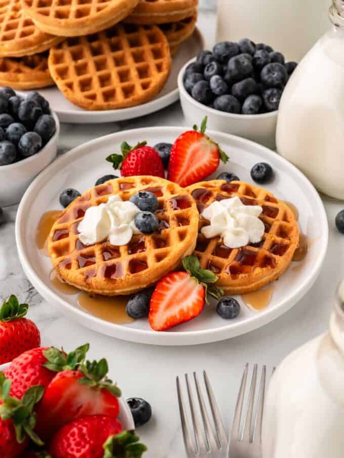 homemade eggo mini waffles with strawberries, blueberries, and whipped cream