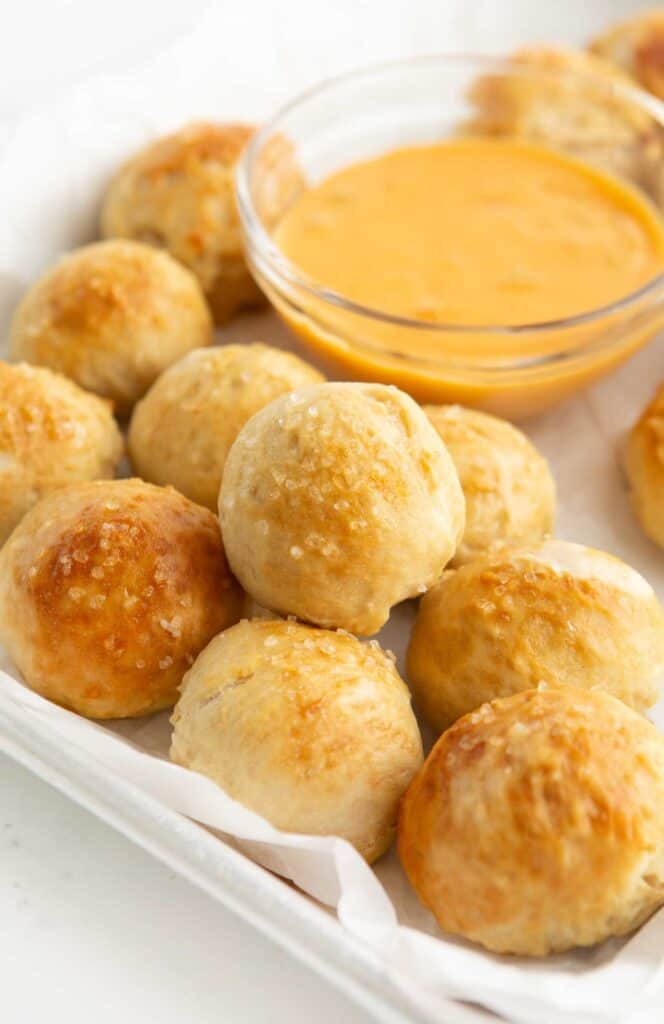 tray of soft pretzel bites with bowl of cheese