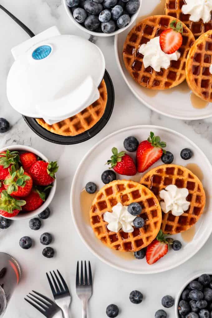 homemade eggo mini waffles with strawberries, blueberries, and whipped cream