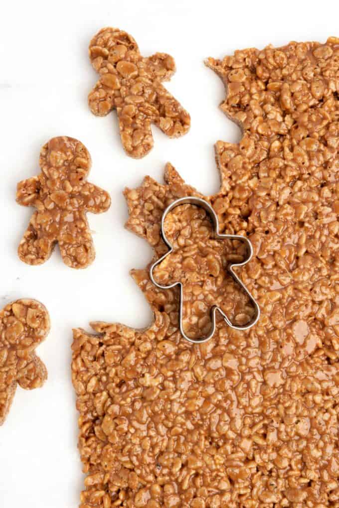 mini gingerbread cookie cutter cutting out star crunch rice krispy bars