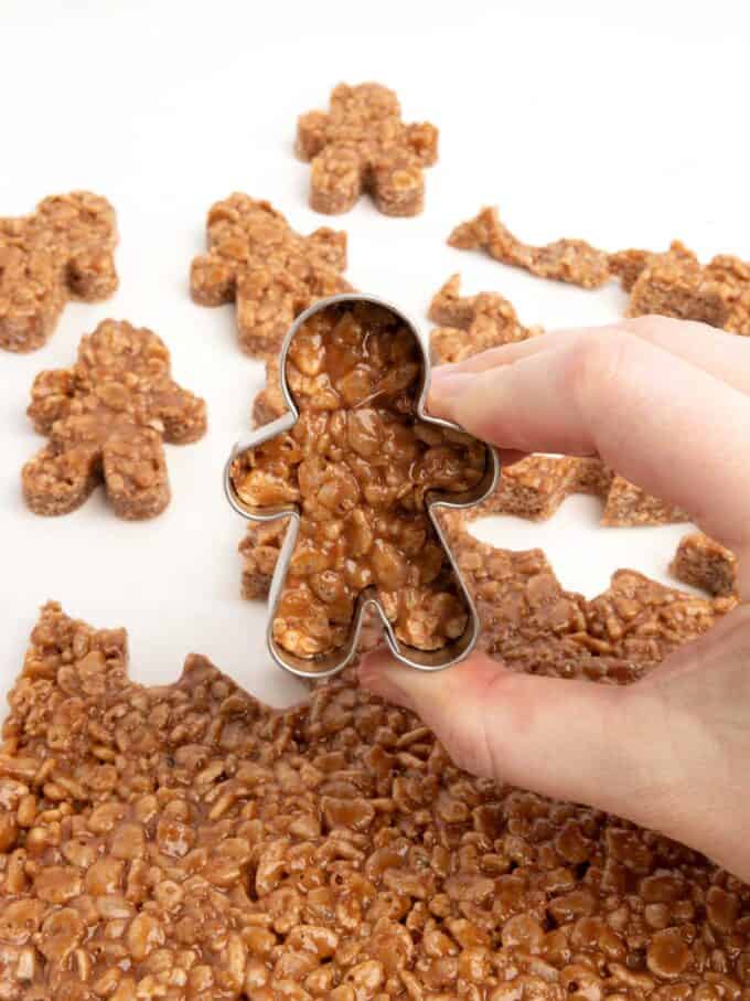 mini gingerbread cookie cutter cutting out star crunch rice krispy bars