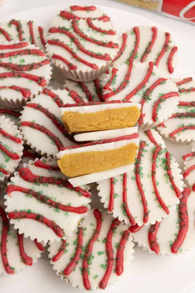 Yellow cake bite in a mini muffin tin that does not require dipping. Decorated as Little Debbie Christmas tree cake
