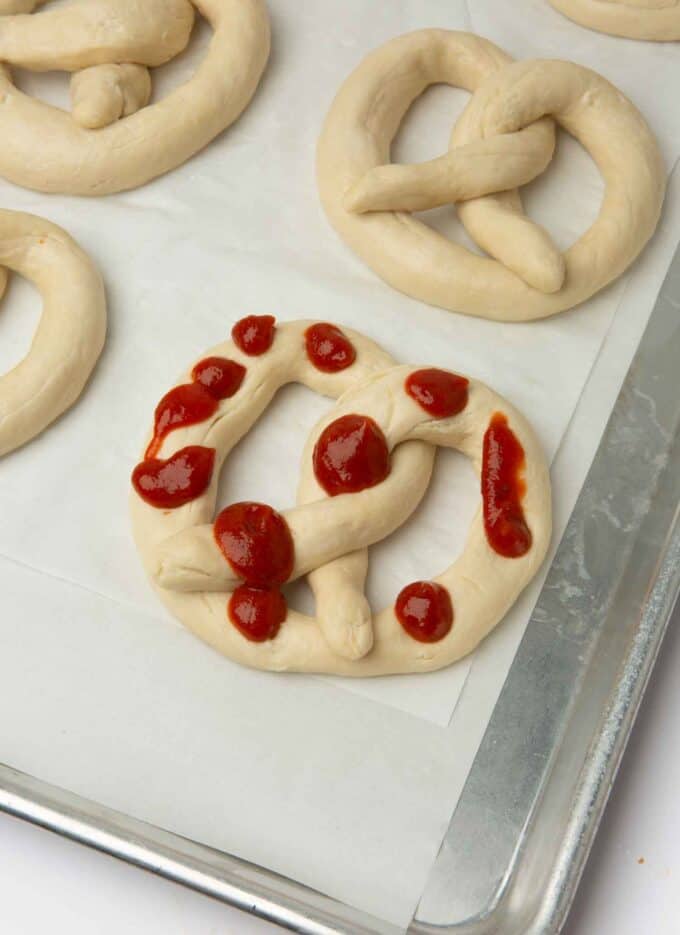 sauce on pretzel dough