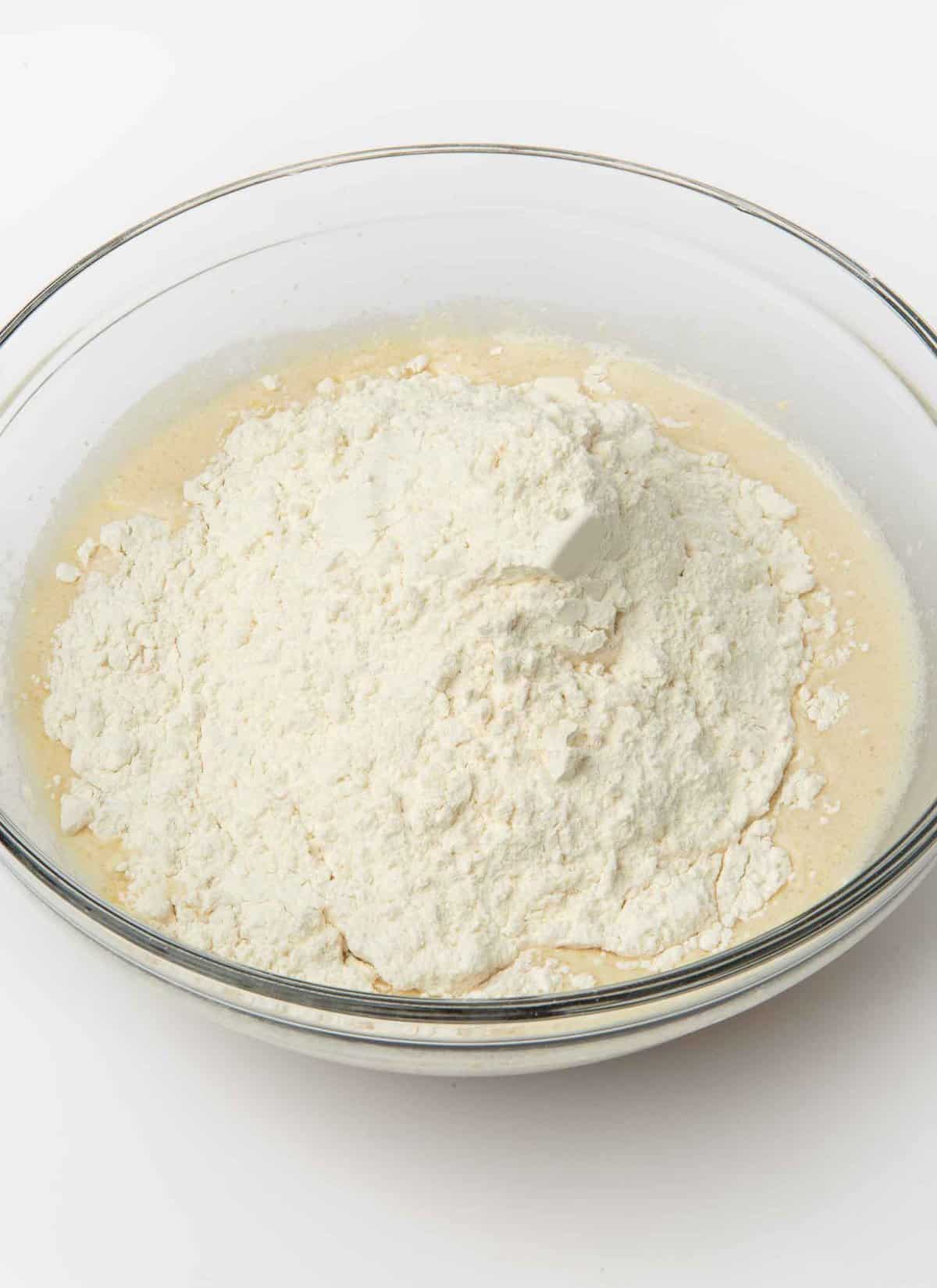 bowl of yeast mixture and flour